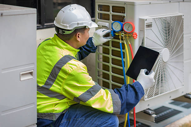 Professional Air Duct Cleaning technician working in Martinsburg, OH
